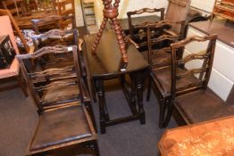 Oak drop leaf dining table and six oak ladder back dining chairs
