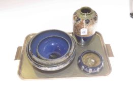 Five pieces of Royal Doulton glazed stoneware, three fruit bowls,