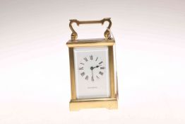 Brass-cased carriage clock,