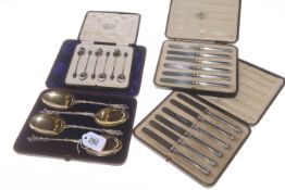Cased set of four electro-plated apostle serving spoons, six silver coffee spoons,