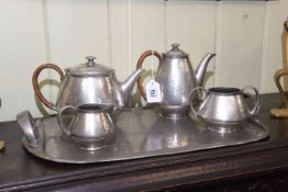 Beaten pewter four piece tea set with two handled tray