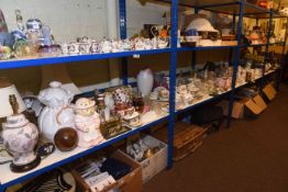 Full shelf of dinner and teawares, Hornby train set, figures, lamps, Pelham puppet, china,