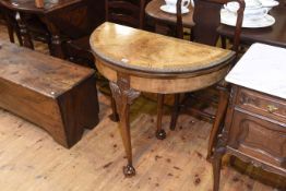 Burr walnut demi lune fold top card table on ball and claw legs