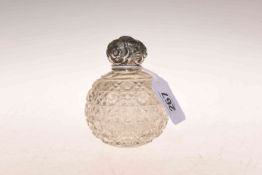 Silver-topped cut-glass scent bottle