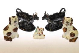 Pair of Victorian cow creamers,