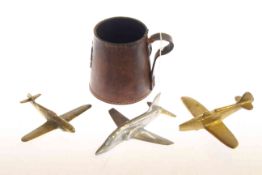 Leather tankard and three plane models