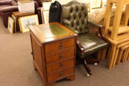 Green leather button back desk chair and two drawer mahogany finish filing cabinet