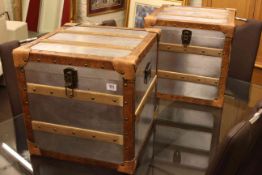 Two leather and aluminium Tiffany storage trunks