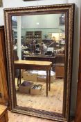 Large Victorian parcel-gilt mirror,
