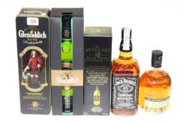 Five bottles of whisky including Glenfiddich and Jack Daniels