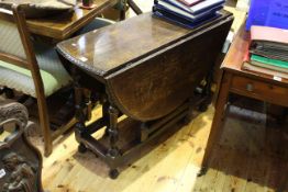 Victorian oak gateleg table with carved edge and block and baluster legs