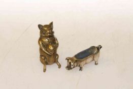 Silver pig pin cushion and a brass pig vesta case (2)