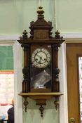 German walnut Vienna clock of small proportions,