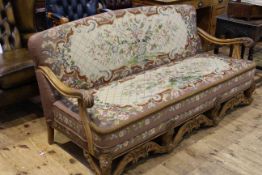 17th Century style carved walnut settee with Aubusson type upholstery,
