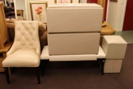 Six pieces of cream leather furniture to include button backed chair, double stool,