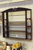 Oak plate rack with scroll carved crest,