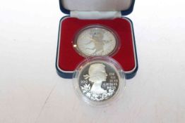 Two 1oz encapsulated silver proof coins 2012,