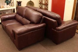 Two brown leather modern settees