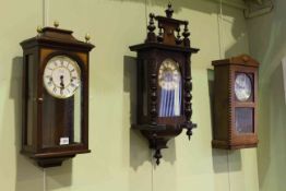 Three wall clocks including Comitti,