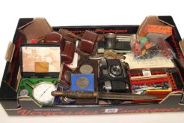 Coins, cameras, instruments, toys,