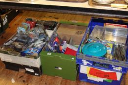 Four boxes of toys and collectables including Dr Who and Lord of the Rings