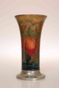 WILLIAM MOORCROFT (1872-1945) FOR LIBERTY & CO A TUDRIC PEWTER AND POTTERY VASE IN THE EVENTIDE