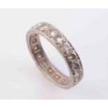 A DIAMOND ETERNITY RING,