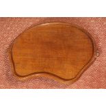 ROBERT THOMPSON OF KILBURN, A MOUSEMAN OAK TEA TRAY, kidney-shaped, with twin mouse handles.