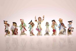 AN ASSEMBLED SET OF NINE GERMAN PORCELAIN MONKEY BAND FIGURES, late 19th Century,