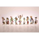 AN ASSEMBLED SET OF NINE GERMAN PORCELAIN MONKEY BAND FIGURES, late 19th Century,