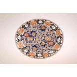 A JAPANESE IMARI OVAL PLATE, LATE 19TH/EARLY 20TH CENTURY, typically decorated with cobalt blue,