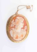 A SHELL CAMEO BROOCH, circa 1900, the oval cameo carved to depict the profile of a maiden,