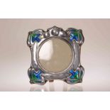 A SILVER AND ENAMEL PHOTOGRAPH FRAME IN THE ART NOUVEAU TASTE, William Hutton & Sons, London 1902,