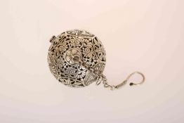 A CHINESE WHITE METAL INCENSE BALL,
