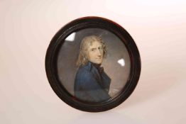 A CONTINENTAL PORTRAIT MINIATURE OF A YOUNG LEARNED GENTLEMAN, c.