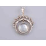 AN EDWARDIAN MOONSTONE AND DIAMOND PENDANT,