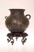 A CHINESE BRONZE POT OF BALUSTER FORM,