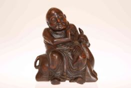 A CHINESE CARVED BAMBOO FIGURE OF A BUDDHA,