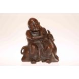 A CHINESE CARVED BAMBOO FIGURE OF A BUDDHA,