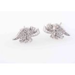 A PAIR OF DIAMOND STUD EARRINGS,