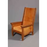 ROBERT THOMPSON OF KILBURN, A MOUSEMAN OAK AND LEATHER SMOKING CHAIR,