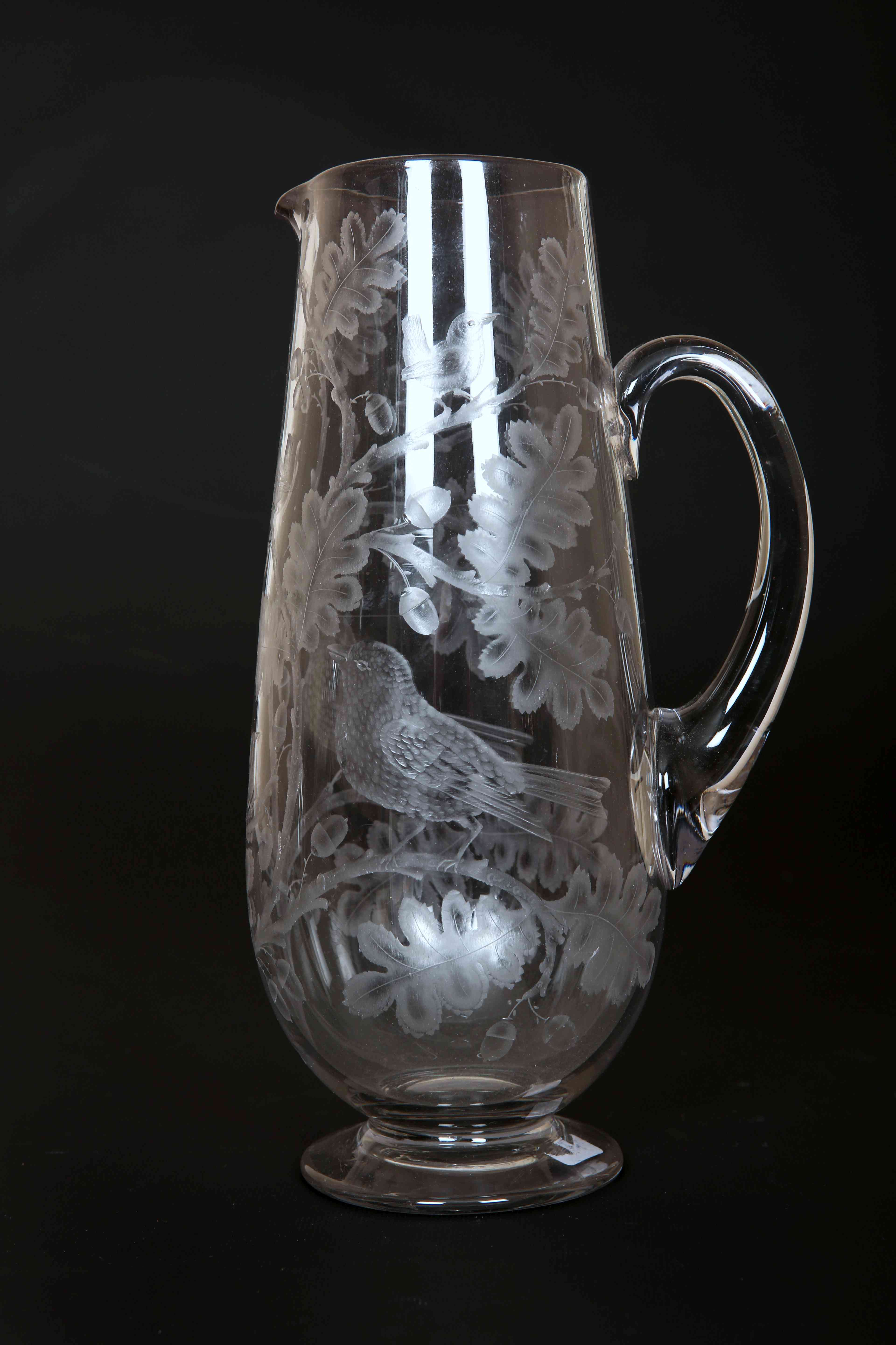 A 19th CENTURY ENGRAVED GLASS WATER JUG, of slender ovoid form,