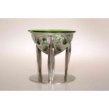 ARCHIBALD KNOX (1864-1933) FOR LIBERTY & CO A TUDRIC PEWTER COUPE, no. 0276, with green glass liner.