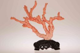 A CHINESE CARVED RED CORAL FIGURE GROUP, the branches modelled as two women,