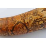 AN AUSTRALIAN POWDER HORN, with scrimshaw decoration of a ship in full sail,