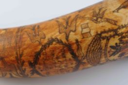 AN AUSTRALIAN POWDER HORN, with scrimshaw decoration of a ship in full sail,