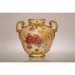 A ROYAL WORCESTER BLUSH IVORY VASE, CIRCA 1896, with twin handles and moulded with scrolls,