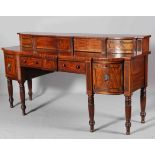 A REGENCY MAHOGANY SIDEBOARD, CIRCA 1825, with breakfront superstructure of drawers and cupboards,