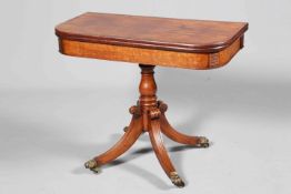 A REGENCY MAHOGANY FOLDOVER TEA TABLE, the crossbanded top with rounded corners,