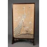 A LARGE JAPANESE SILK SCREEN, early 20th Century, the stained oak moulded frame raised on trestles,